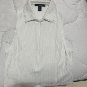 vest like, top, kinda off-whiteish.